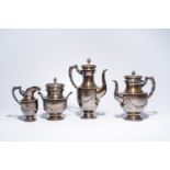 A four-piece French silver coffee and tea set with garlands, maker's mark Simon Slisonski, 950/000,
