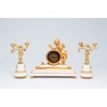 A French gilt bronze mounted white marble three-piece clock garniture with putti, 19th C.