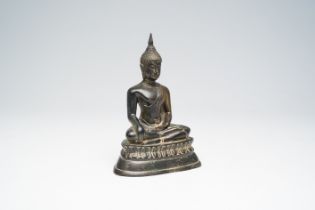 A bronze sculpture of the seated Buddha, Southeast Asia, 18th/19th C.