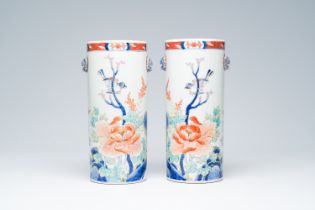 A pair of Japanese Imari hat stands with birds among blossoming branches, Sei Ji Kai Sha mark (Pure