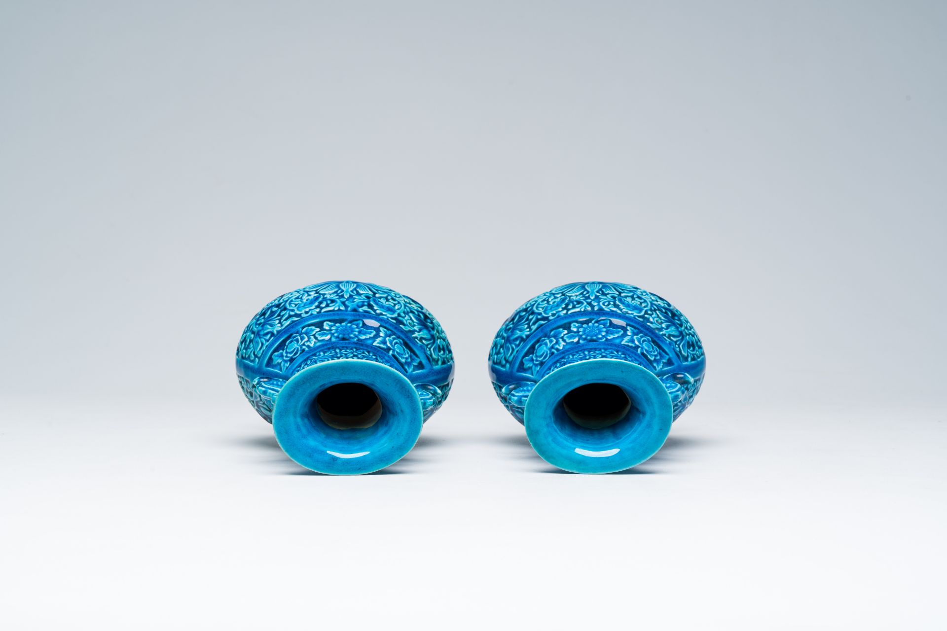 A pair of Chinese turquoise glazed 'lotus' vases, Republic, 20th C. - Image 5 of 6