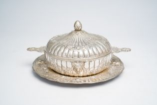 A French silver tureen and cover on stand with ram's heads and flower garlands, last quarter 18th C.