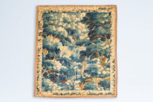 A Flemish wall tapestry with a forest view, 17th C.