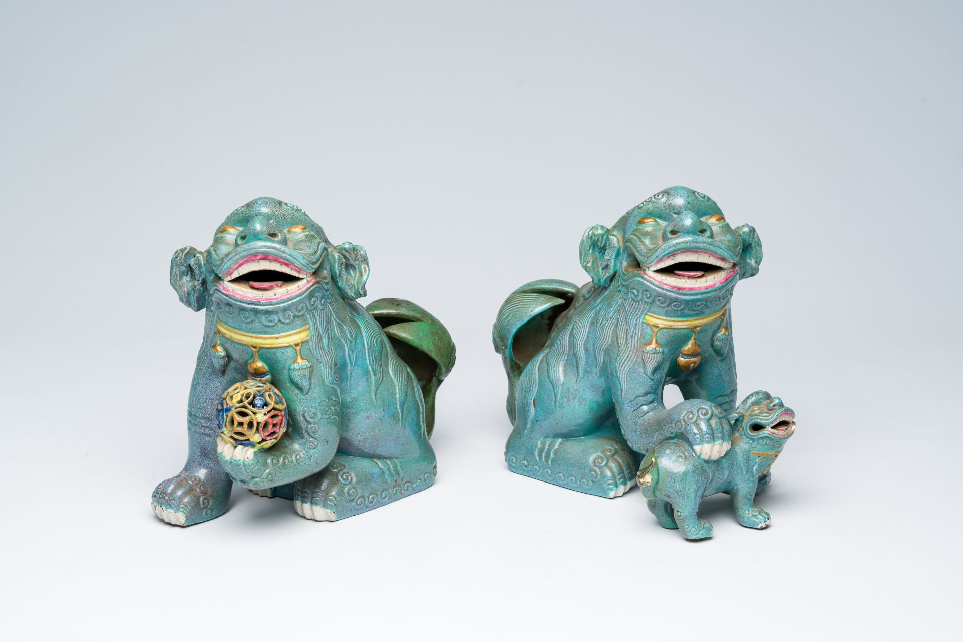 A pair of Chinese robin's egg glazed Buddhist lions, Republic, 20th C.