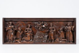 A large Flemish carved wood 'Nativity' panel, 17th C.