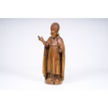 A carved wood blessing figure with papal tiara, 17th/18th C.