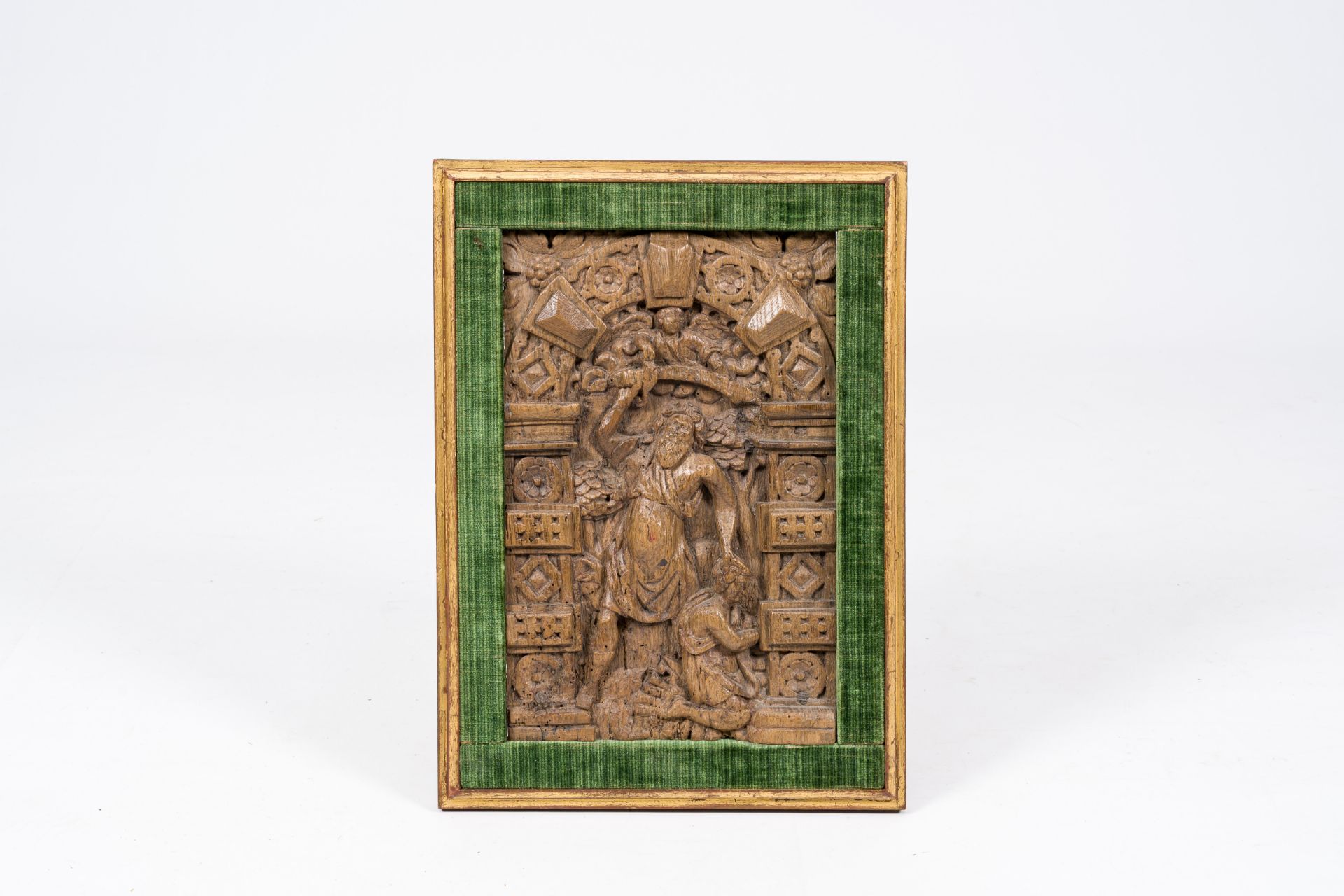 A carved wood alto relievo depicting the sacrifice of Isaac, 16th C.