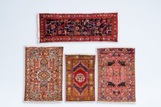 Four various Caucasian rugs with geometric design, wool on cotton, 20th C.