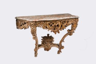 A French Louis XV style wood console with a flower basket, marble top and traces of polychromy, 18th