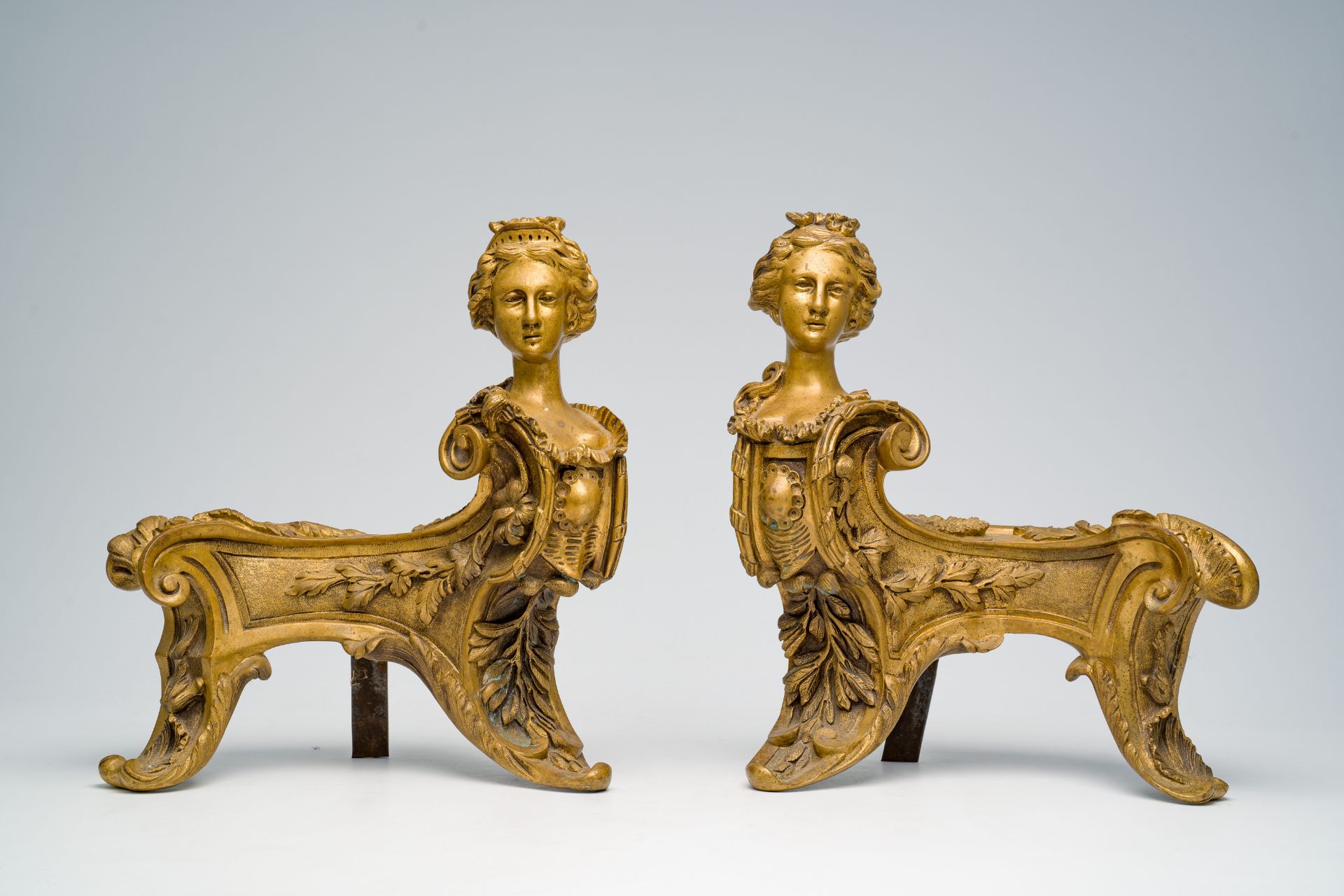 A pair of French Louis XIV style bronze andirons crowned with a regal lady's bust in the manner of F - Image 2 of 8