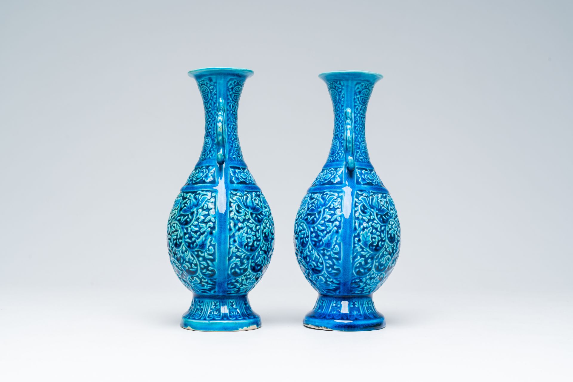 A pair of Chinese turquoise glazed 'lotus' vases, Republic, 20th C. - Image 2 of 6