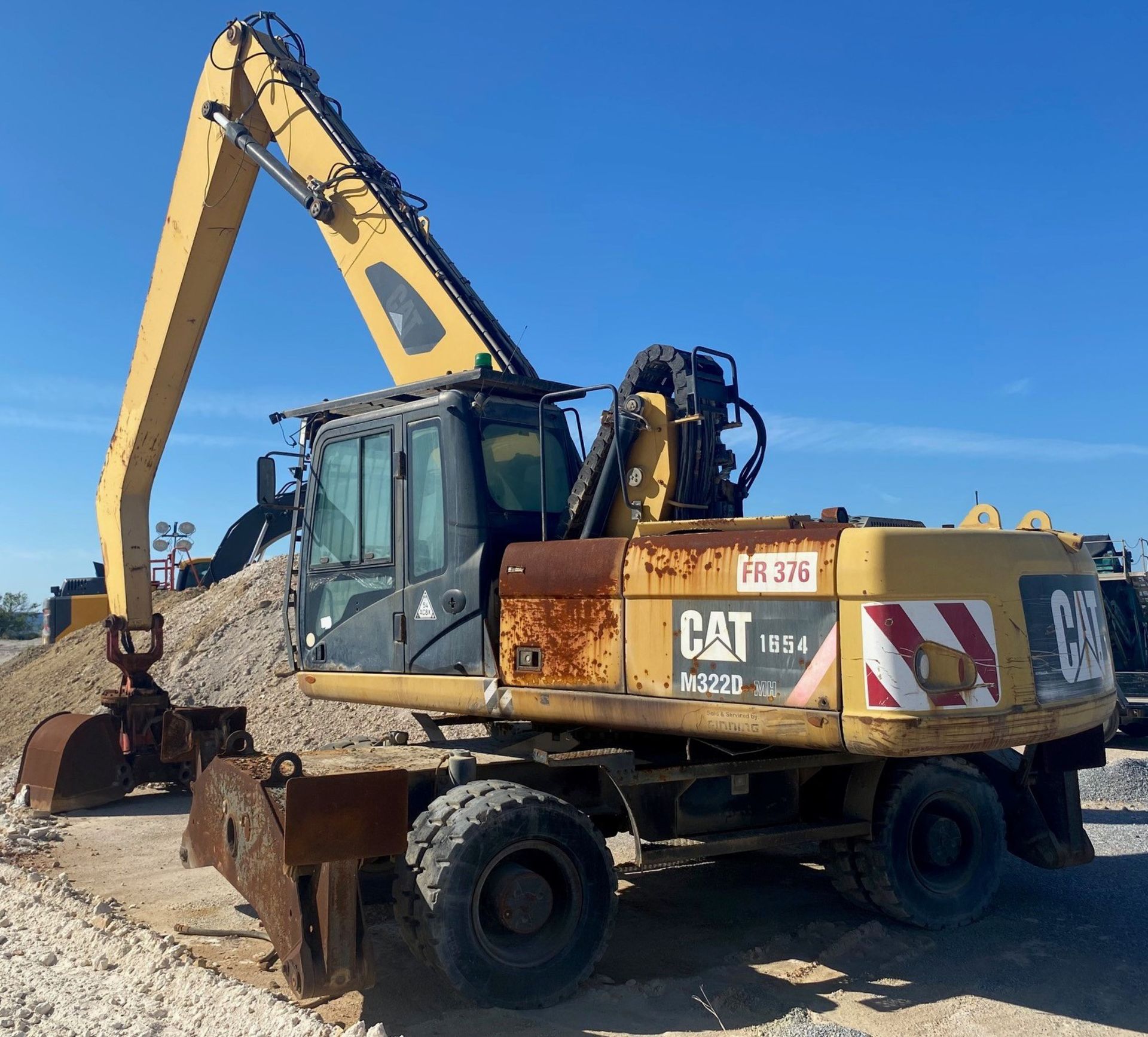 CATERPILLAR (2010) M322D HYDRAULIC WHEEL EXCAVATOR WITH 25,000 LB. MAX. CAPACITY, HYDRAULIC