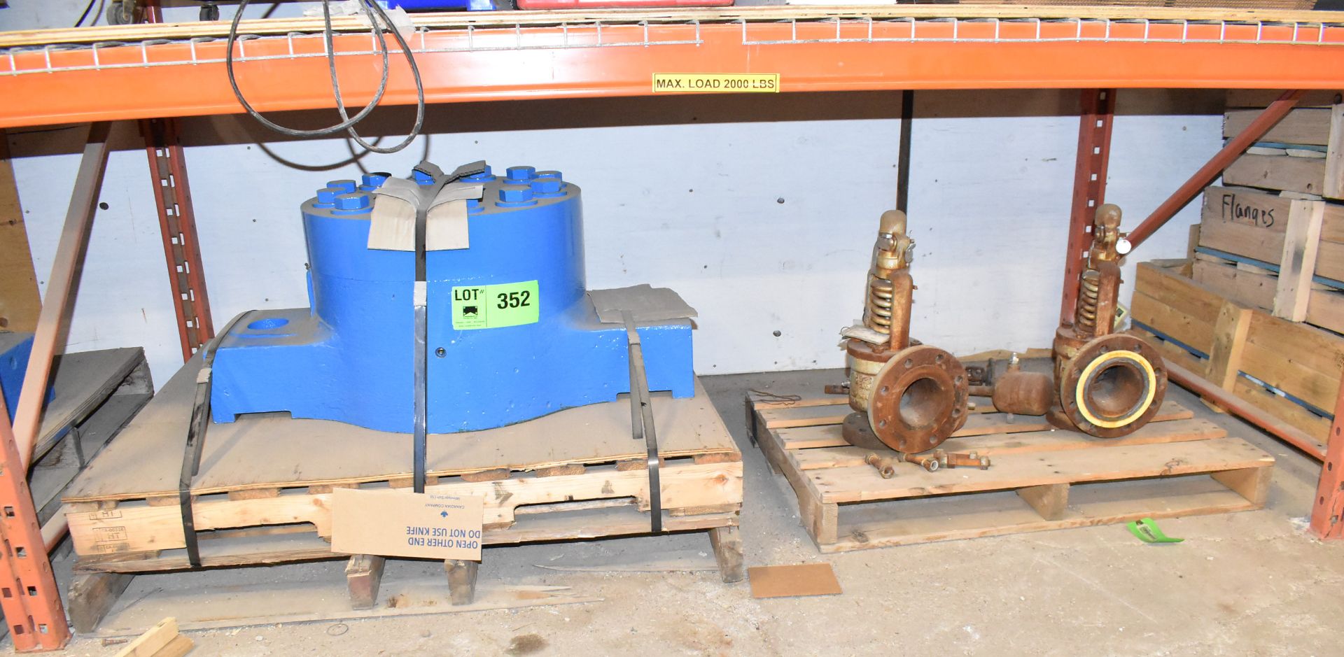 LOT/ CONTENTS OF SHELF CONSISTING OF COMPACTOR ROLLER HOUSING AND VALVES (CI) [RIGGING FEE FOR