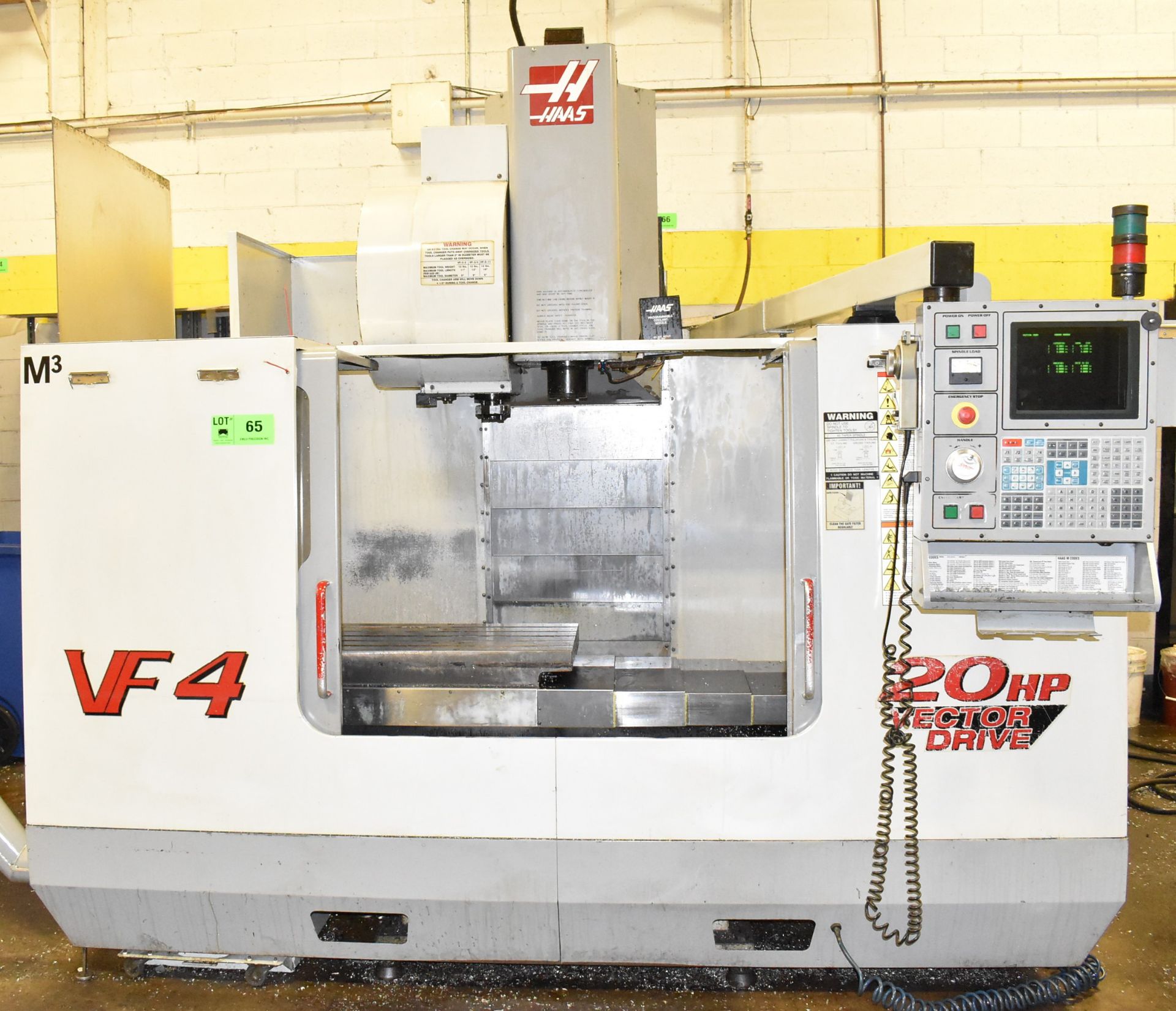 HAAS VF-4 CNC VERTICAL MACHINING CENTER WITH HAAS CNC CONTROL, 18" X 52" TABLE, TRAVELS: X-50", Y-