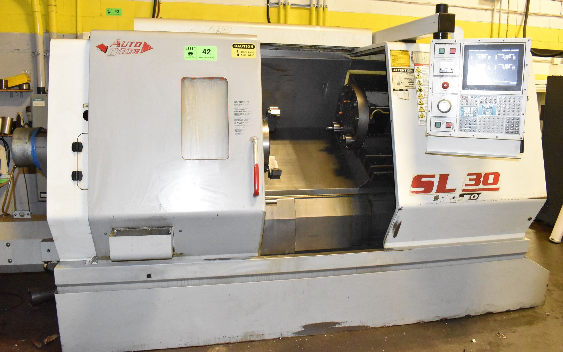 HAAS SL30TB CNC TURNING CENTER WITH HAAS CNC CONTROL, 15" 3-JAW HYDRAULIC CHUCK, 4" SPINDLE BORE,