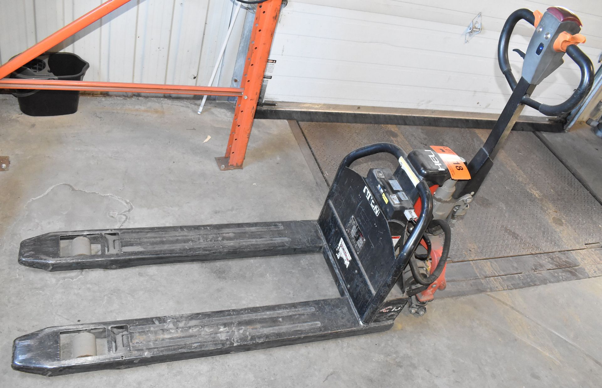 HELI 1,500 LB. CAPACITY 24V ELECTRIC WALK-BEHIND PALLET TRUCK WITH YOUNG 24V PLUG-IN CHARGER, S/N: