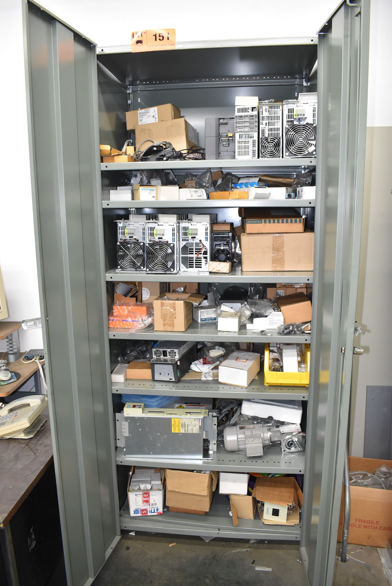 LOT/ HIGHBOY CABINET WITH CONTENTS - INCLUDING SIEMENS COMPONENTS, CONTROL MODULES, ELECTRIC