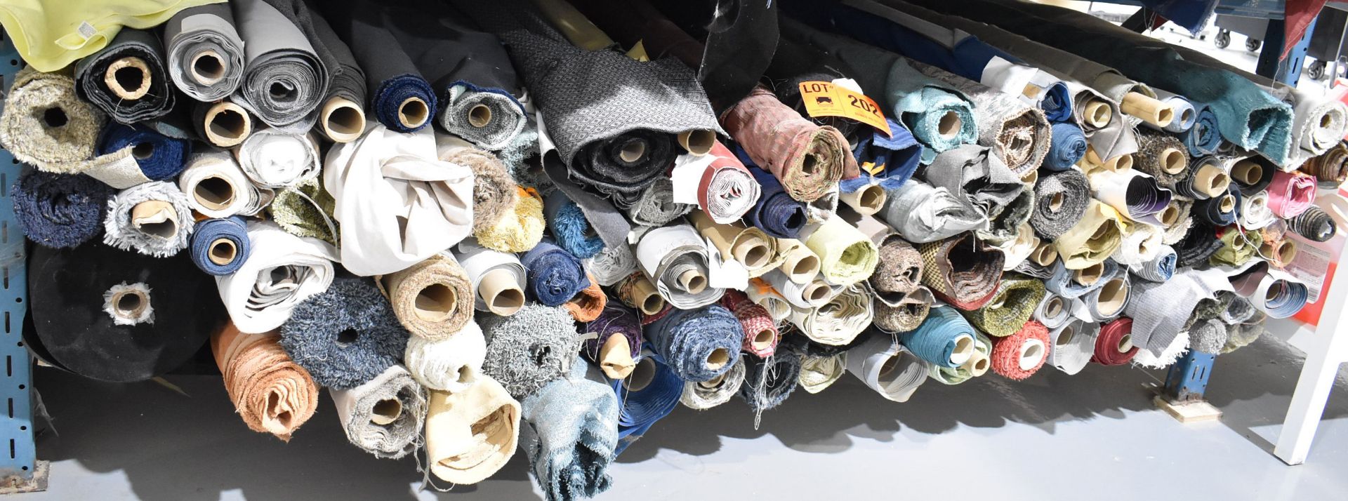 LOT/ CONTENTS OF SHELF CONSISTING OF FABRIC ROLLS