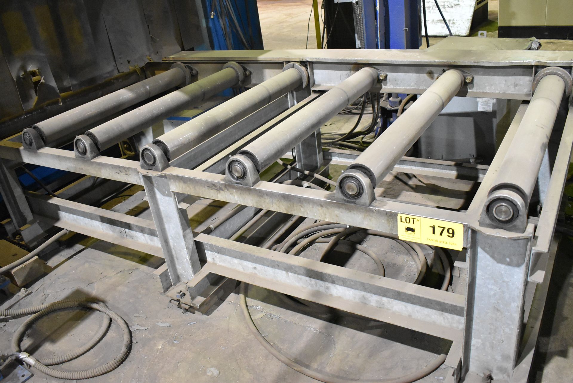 APPROX. 40' PROGRAMMABLE OUTFEED ROLLER CONVEYOR (CI) [RIGGING FEES FOR LOT #179 - $200 USD PLUS