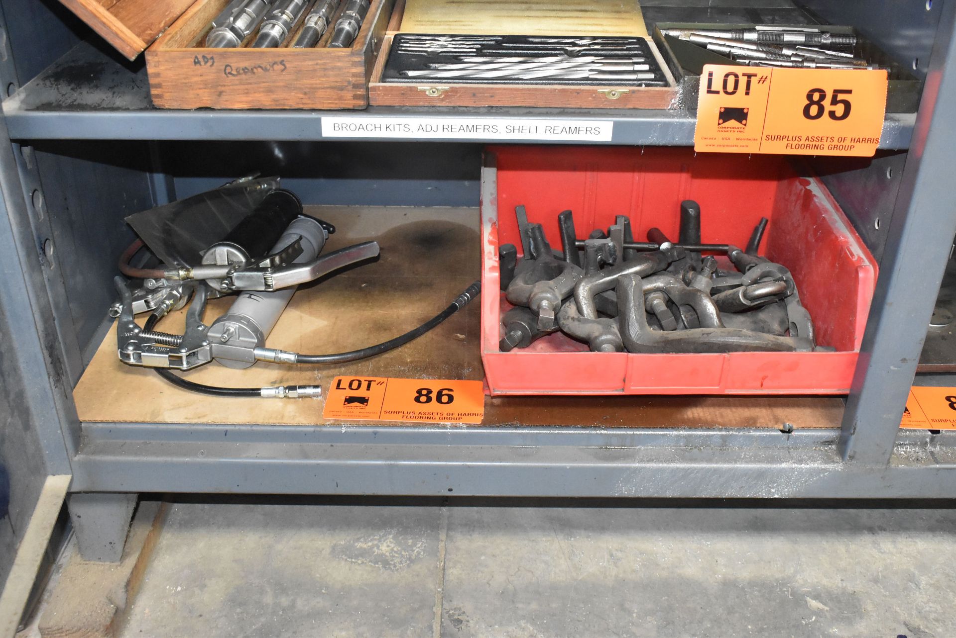 LOT/ CONTENTS OF SHELF - GREASE GUNS & LATHE DOGS