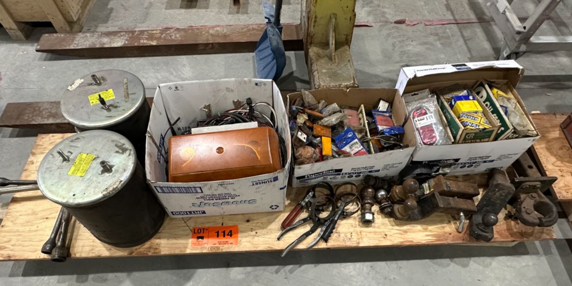 LOT/ skid and contents - hitch balls, hooks and hardware