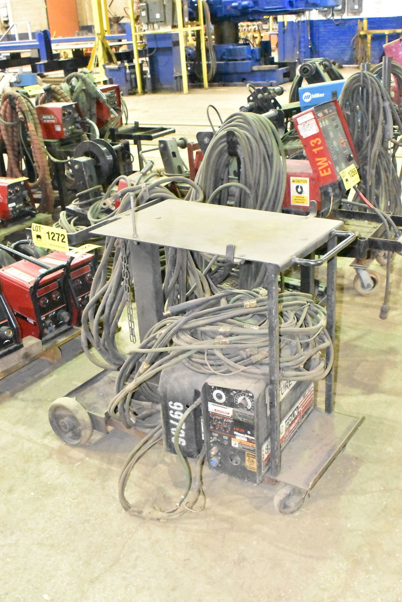 LOT/ (2) LINCOLN ELECTIRC LN-25 WIRE FEEDERS WITH CABLES & CART [RIGGING FEES FOR LOT #1272 - $30