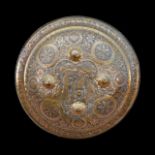 AN INDO-PERSIAN CEREMONIAL ENGRAVED DHAL SHIELD 19TH CENTURY.