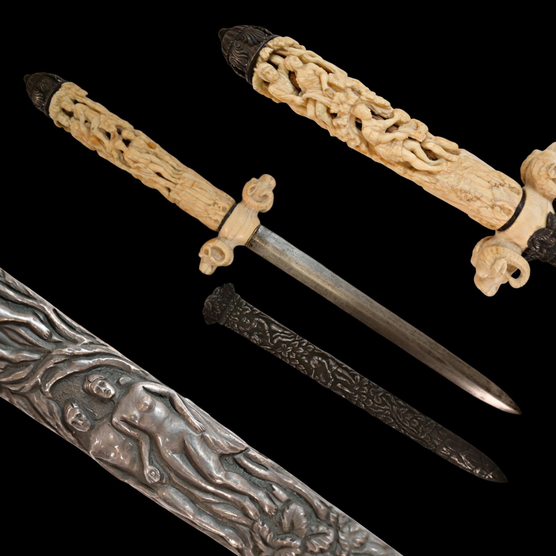 A fine French dagger with carved bone hilt and silver scabbard with erotic scenes, 19th century.