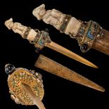 A unique Austrian dagger with a carved bone hilt decorated with gold, precious stones and enamel.