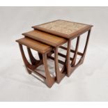 Mid-century G-Plan-style teak nest of three occasional tables, largest with tile top, 51cm high x