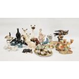 Spanish porcelain figure of a suited ballet dancer, a Nao porcelain seated bear, a pair of Poole