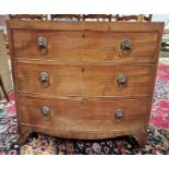 Late 19th/early 20th century bowfront mahogany chest of drawers having three long drawers, each with