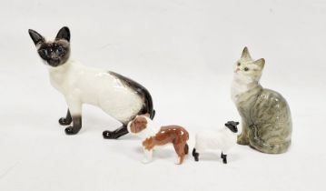 Two Beswick models of cats, a Beswick model of a bulldog and a Beswick model of a sheep (4)