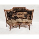 19th century walnut framed settle, carved support, raised on seven splayed feet, the front three