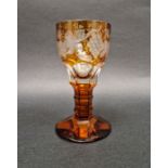 Late 19th century/early 20th century Bohemian amber glass faceted goblet with etched grape and
