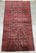 North East Persian red ground Turkoman rug with repeating geometric pattern, multiple geometric