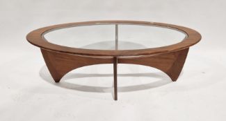 Mid-century G-Plan teak Astro oval coffee table with glass top, raised on curved supports, 42cm high