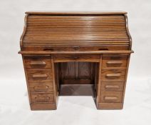 Early 20th century oak roll top desk, 103cm high x 120cm wide x 64cm deep