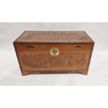 Oriental campherwood rectangular chest with carved panel decoration, 104cm wide