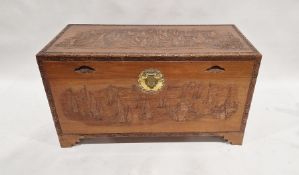 Oriental campherwood rectangular chest with carved panel decoration, 104cm wide