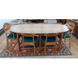 1969/1970 Oliver Morel Cotswold School walnut oval dining table and chairs, the table having figured