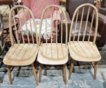 Set of four Ercol-style spindle back dining chairs together with an Ercol similar chair with