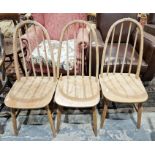 Set of four Ercol-style spindle back dining chairs together with an Ercol similar chair with