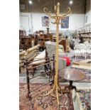 Late 19th/early 20th century mahogany table of circular form raised on tripod support, with cabriole