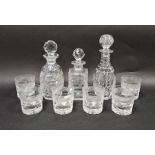 Waterford cut glass decanter, two further cut glass decanters and a set of six cut glass tumblers (