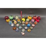Large quantity of glass paperweights to include five Murano glass paperweights in the form of apples