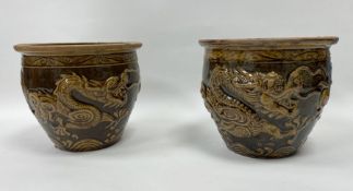 Two matched Chinese dragon decorated jardinieres, brown glaze, 15.5cm high and 19cm in diameter