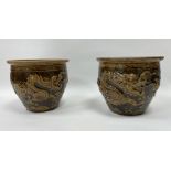 Two matched Chinese dragon decorated jardinieres, brown glaze, 15.5cm high and 19cm in diameter
