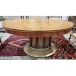 Austrian chequered oak oval dining table with ebony stringing, on oval curved panel column, hammered