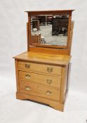 20th century pine dressing chest of three long drawers with mirror back, on bracket feet, 157cm high